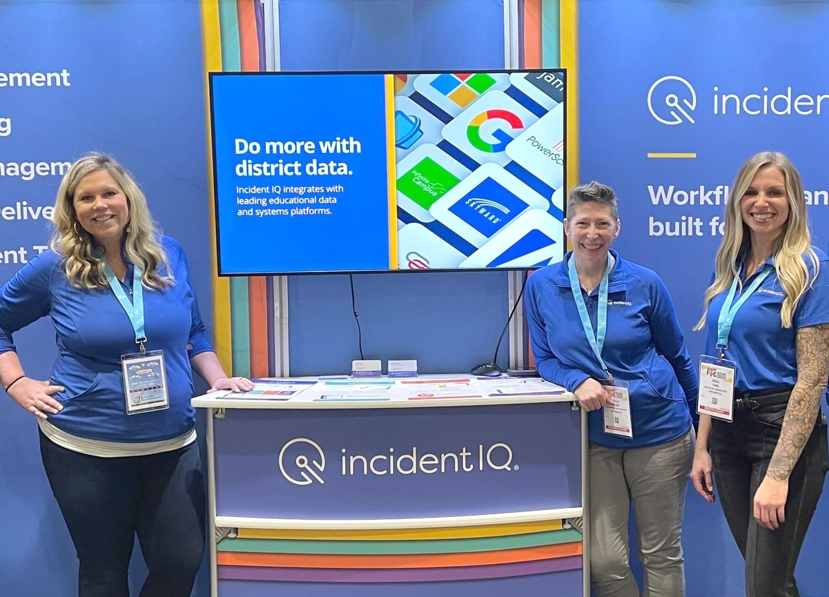 Incident IQ team in their tradeshow booth.